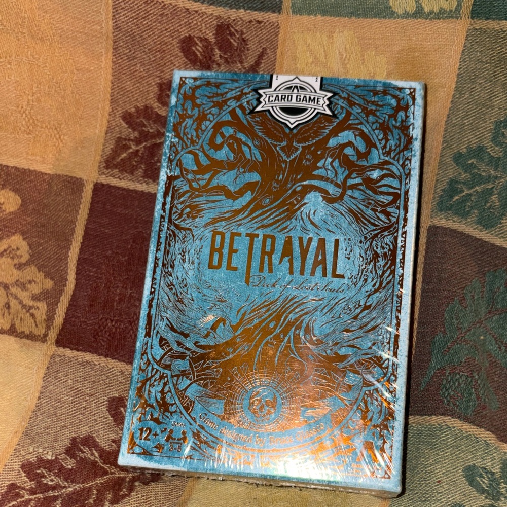 Hasbro Betrayal Card Game with Blue and Red Accents